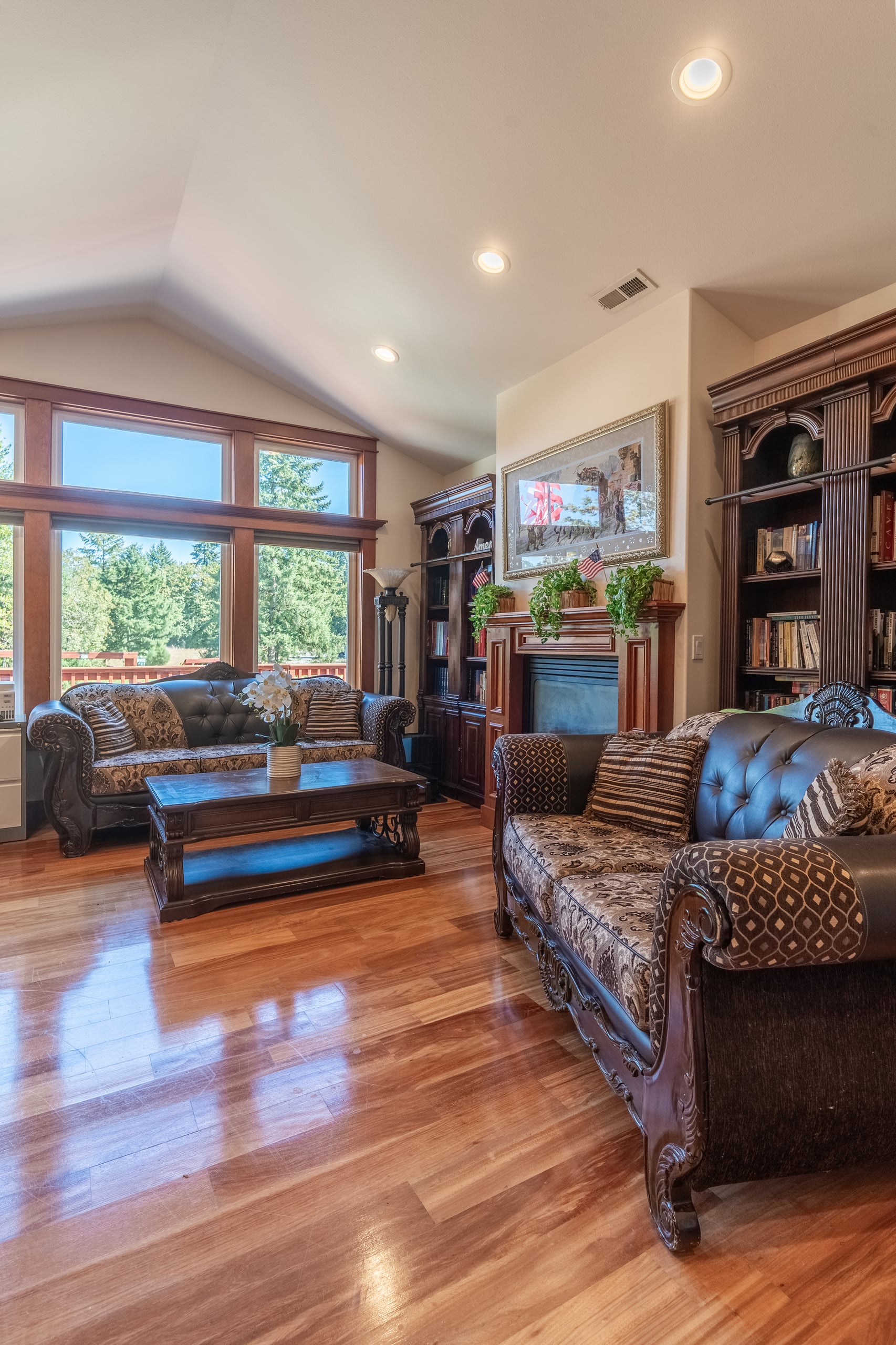 Bookshelves and comfortable seating in the second living room.